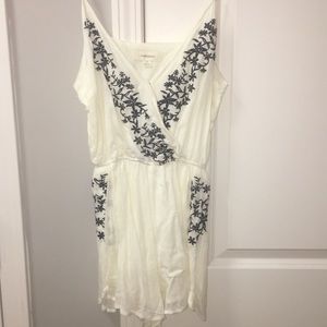 Navy blue and cream floral romper